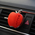 An apple-shaped car air freshener with floral fragrance - featuring a decorative ventilation clip design